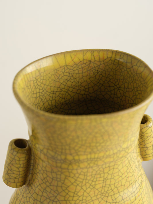 Golden Lattice Celadon Vase, featuring a yellow crackle glaze with geometric patterns and twin side handles.