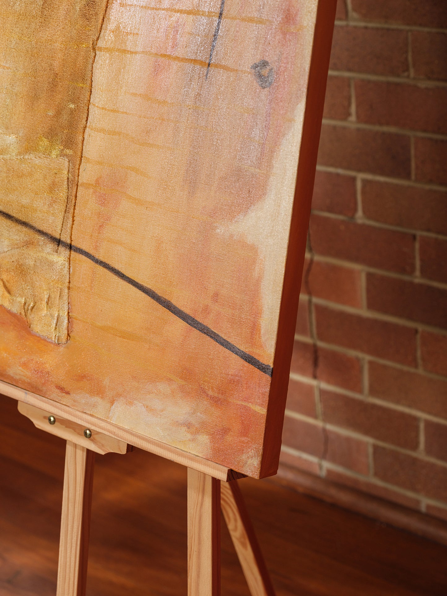 Abstract textured painting titled Golden Palimpsest, featuring layered golden ochre tones with subtle lines and organic forms on canvas.