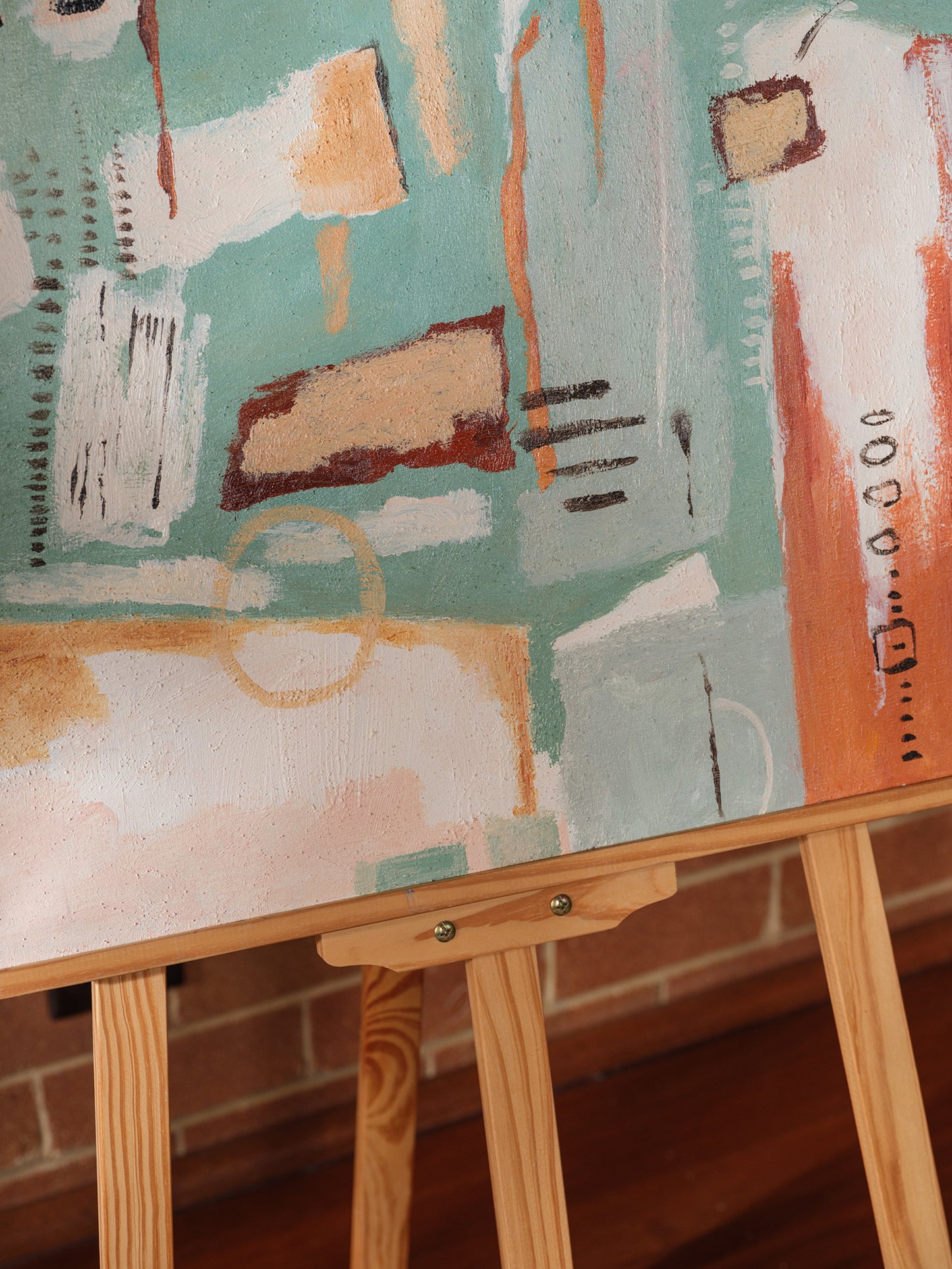 Abstract painting titled Soft Geometry at Dusk, featuring pastel orange, teal, and blush geometric shapes with expressive brushstrokes on canvas.