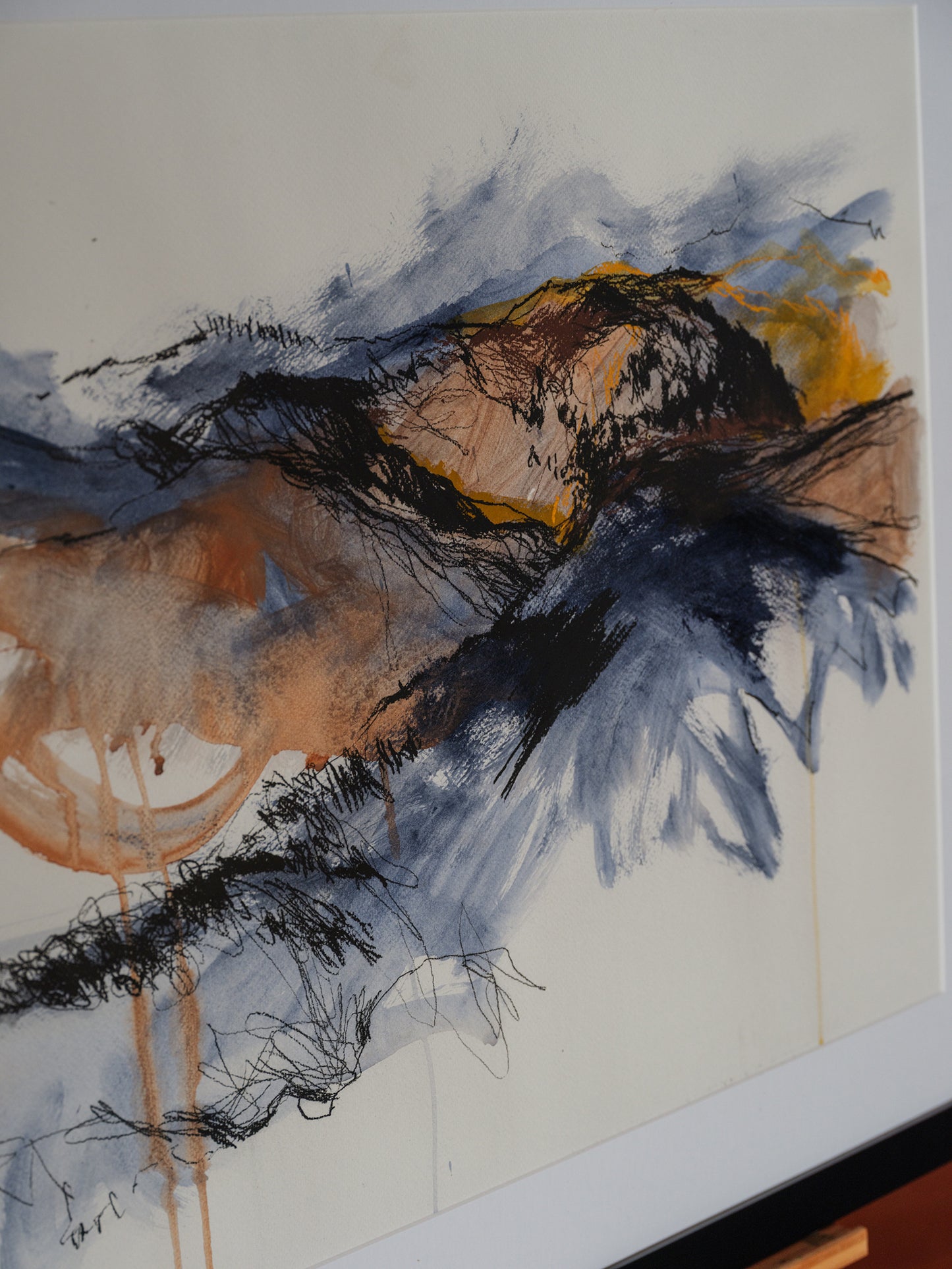 Framed drawing titled Storm Over Ridges (2021) by Melanie Cooper, created with acrylic and charcoal on paper, signed and presented under glass