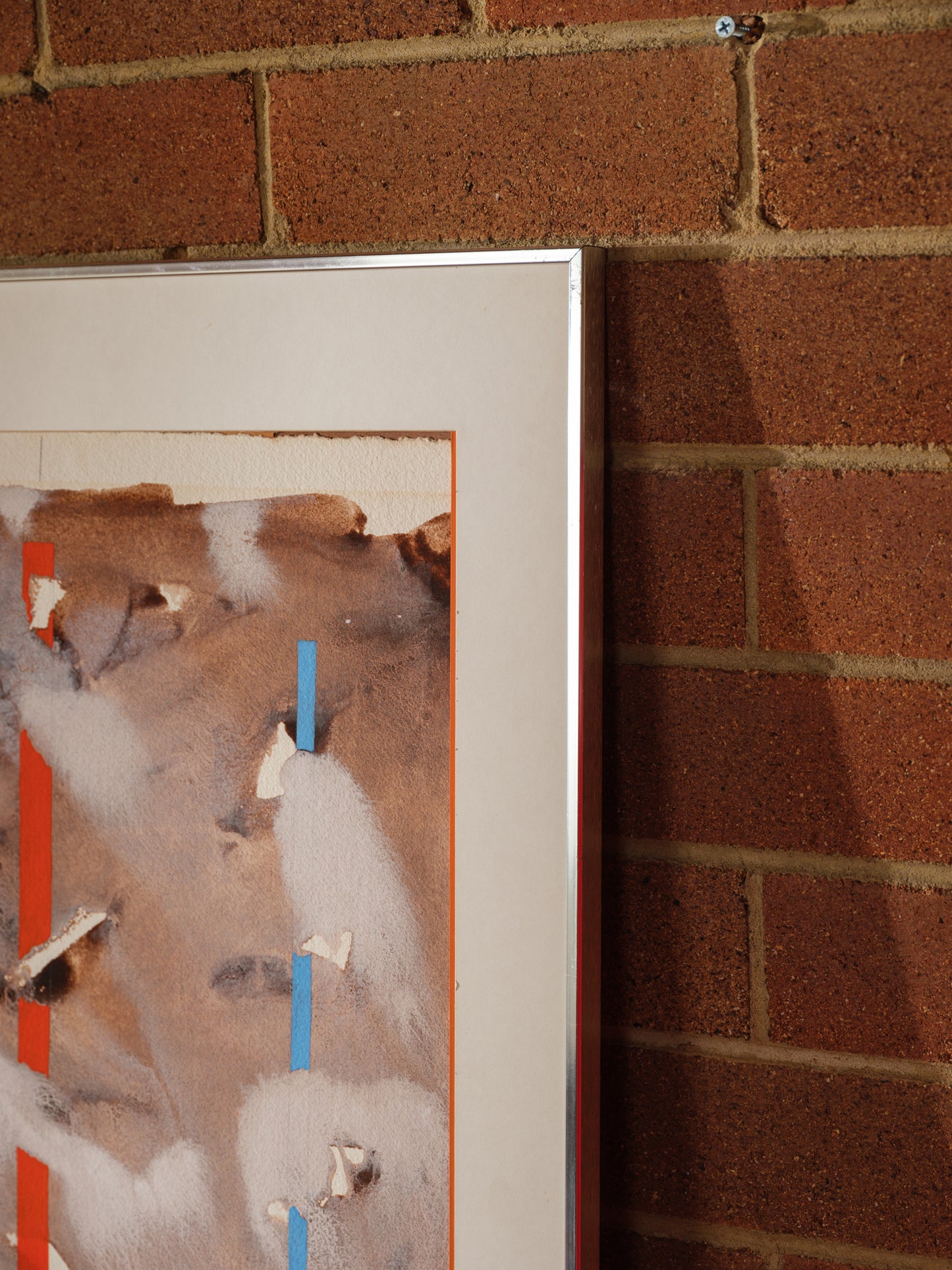 Mixed media artwork titled Weathered Signals, featuring layered earthy textures with vertical signal-like lines in red, yellow, and blue.