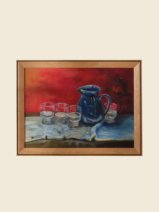 Oil painting titled Cobalt Pitcher and Glasses, featuring a deep blue jug and six clear glasses arranged on a striped cloth with a rich red background.