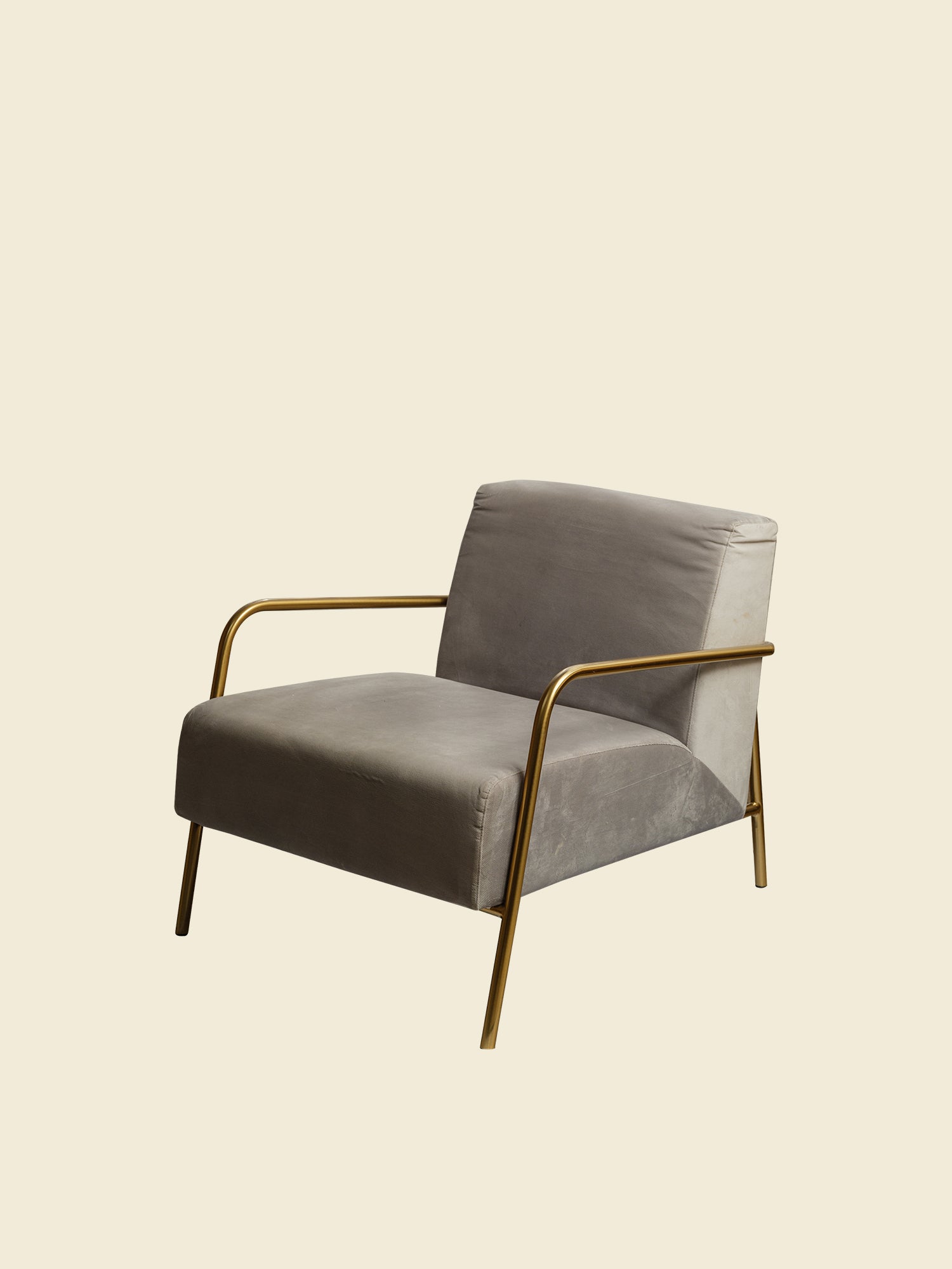 Contemporary lounge accent chair with soft grey upholstery and gold metal frame