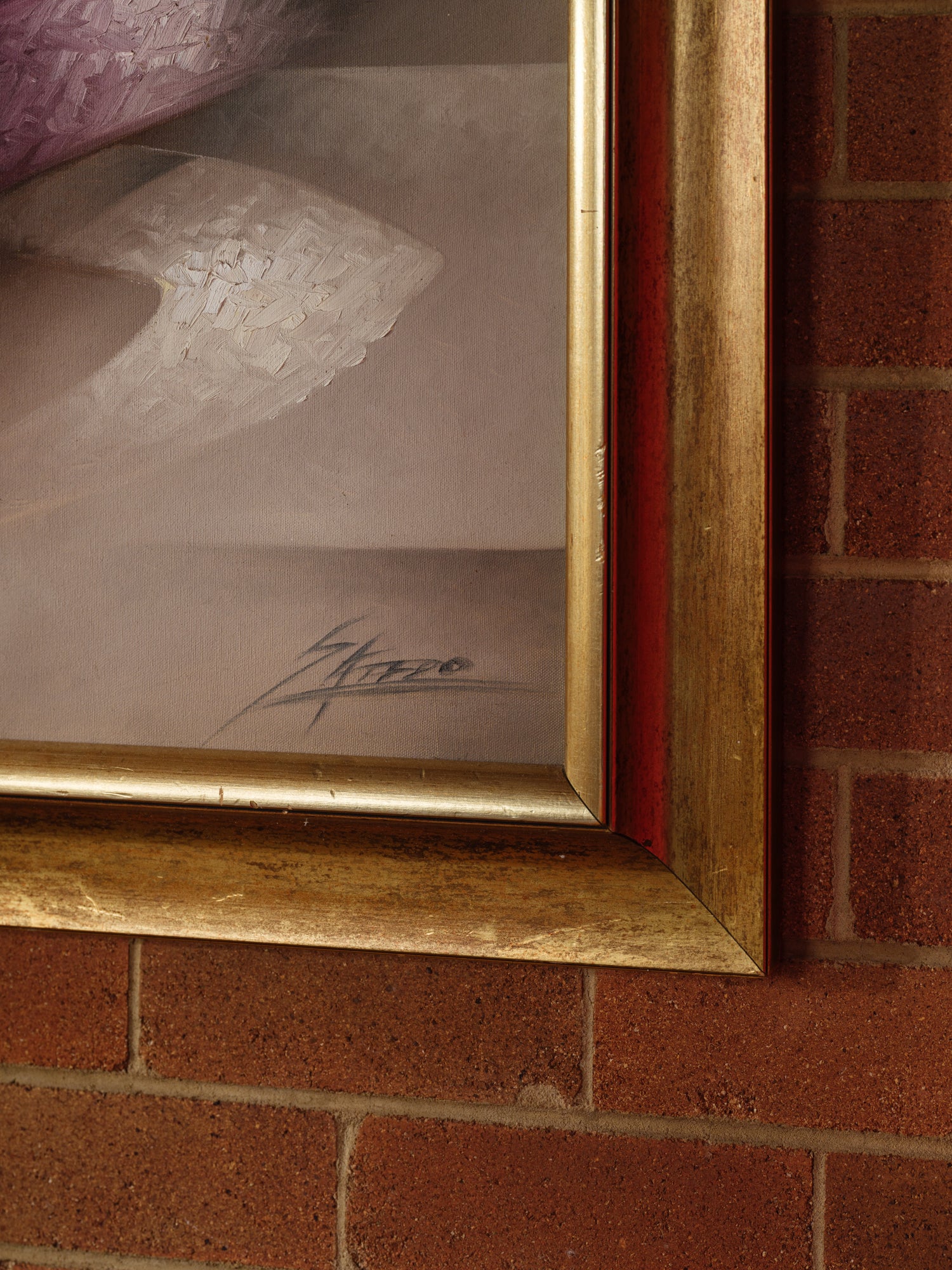 Oil painting titled Gilded Ribbons, featuring sweeping abstract curves in gold, crimson, and muted tones, layered over a smoky brown and grey background, framed in gold.
