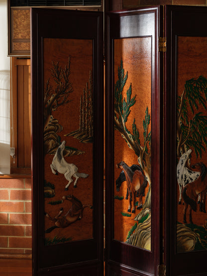 Four-panel wooden screen titled Herd Beneath the Pines, featuring hand-painted horses beneath pine trees in a traditional Chinese landscape style.