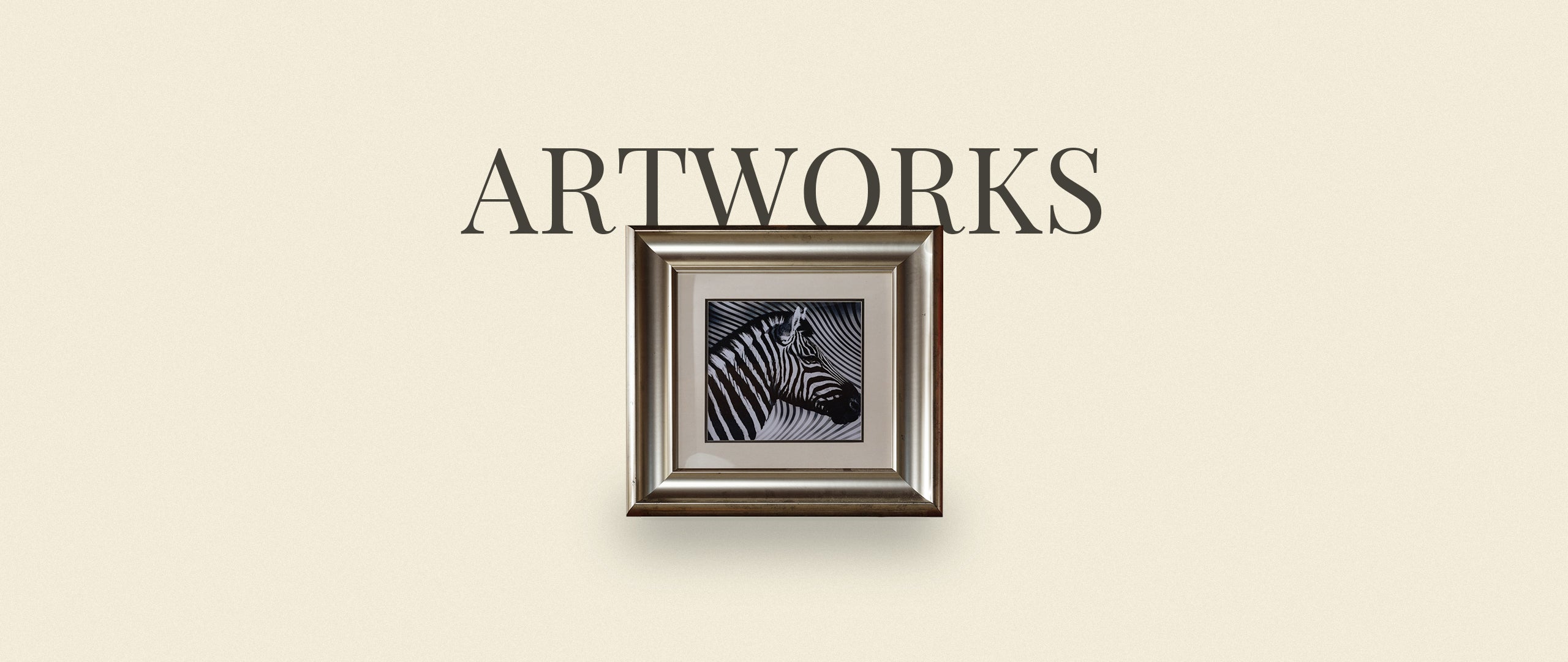 Hero banner for the SYP Homes Artworks Collection, featuring a framed black-and-white zebra artwork on a neutral background.