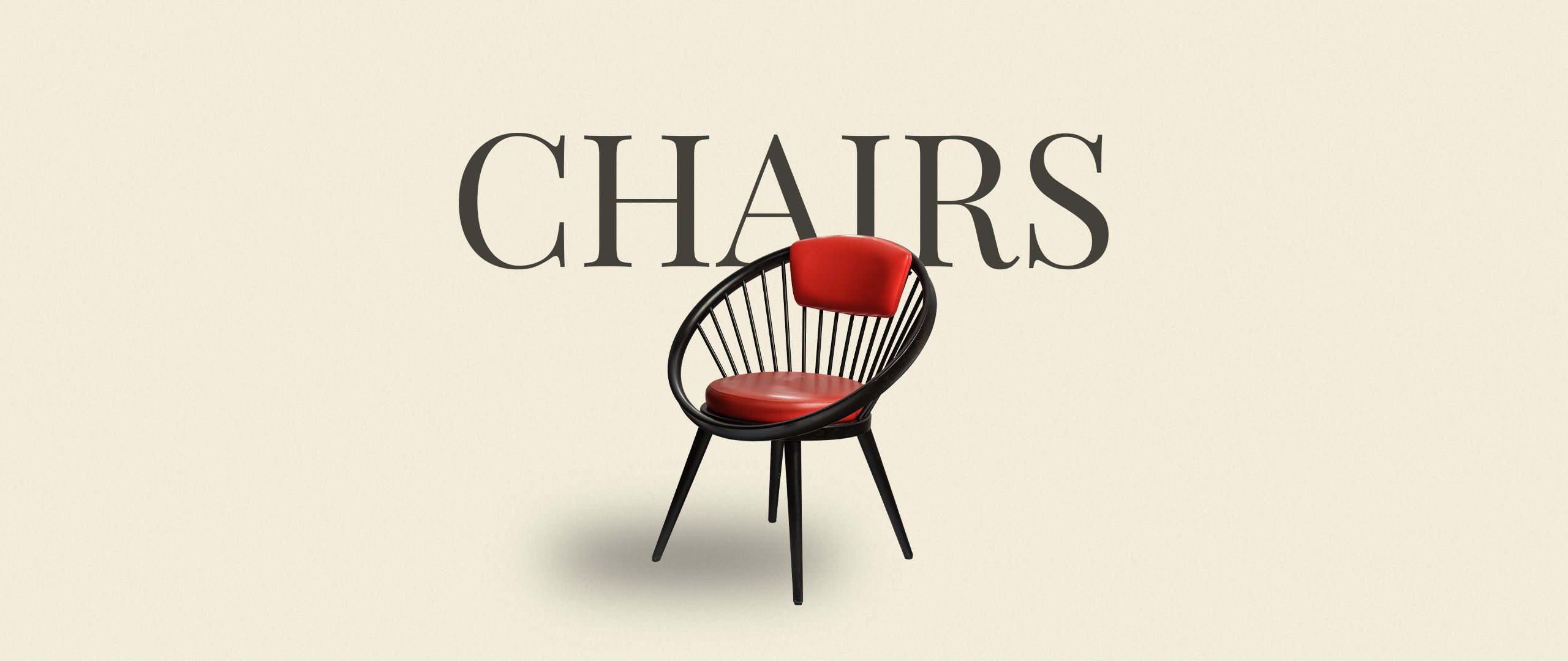 Hero banner for the SYP Homes Chairs Collection, highlighting a modern black spindle chair with a red seat and backrest