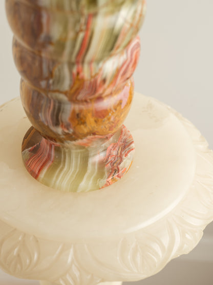 Honey Onyx Ripple Vase with natural striations in warm amber, cream, and green tones, carved in a rippled cylindrical form.