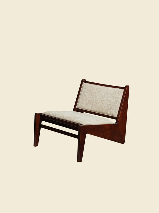 Low armchair with dark brown wooden frame and beige fabric upholstery, modern vintage design