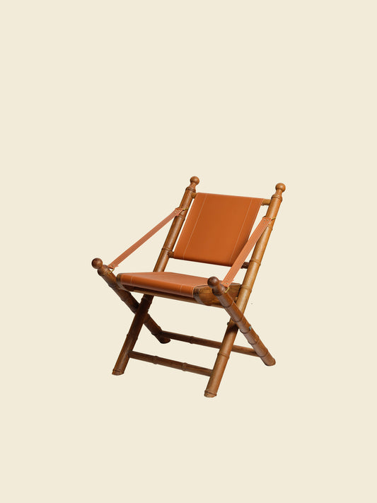 Replica faux bamboo and cognac leather safari style folding chair, vintage-inspired design