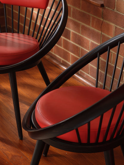 Vintage round chair by Yngve Ekström, 1960s design with black frame and red leather seat and backrest