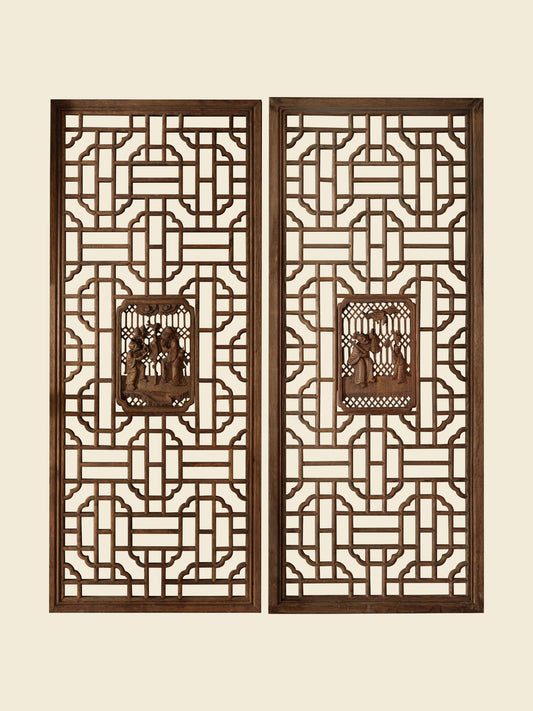 Pair of antique Chinese lattice panels with intricate geometric fretwork and carved scholar scenes in relief at the center.