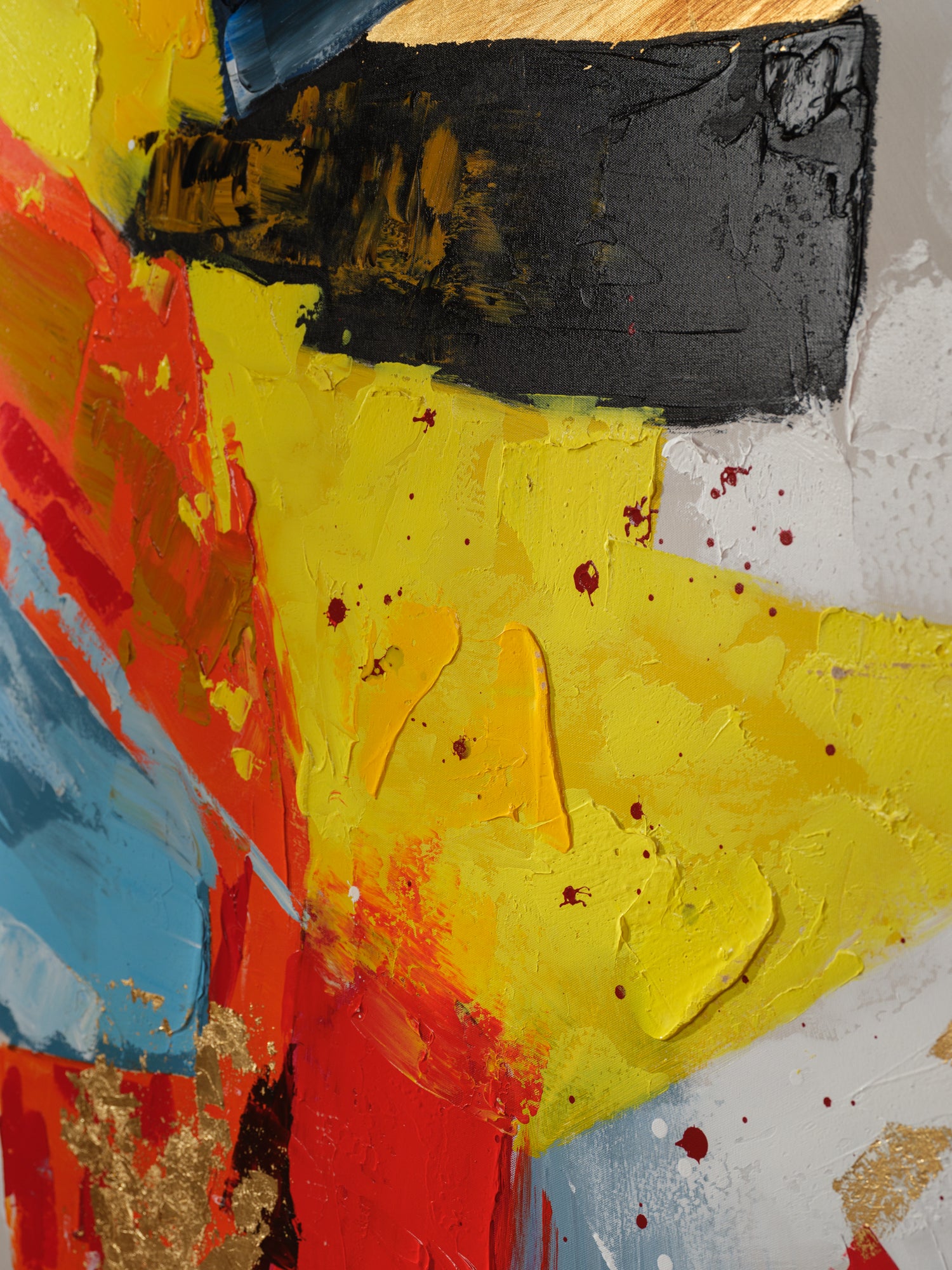 Abstract acrylic painting titled Solar Rift, featuring bold strokes of yellow, red, black, and blue with textured gold accents.