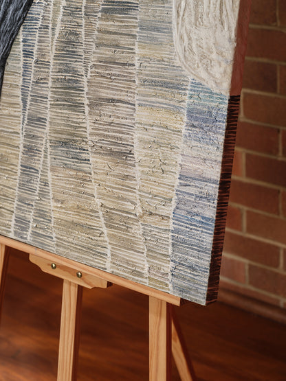 Abstract textured painting titled Tidal Strata II, featuring layered vertical bands in cream, beige, and charcoal tones on canvas.