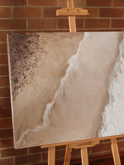 Abstract textured painting titled Tideworn Dune, featuring layered sandy beige and white tones evoking coastal dunes on canvas.