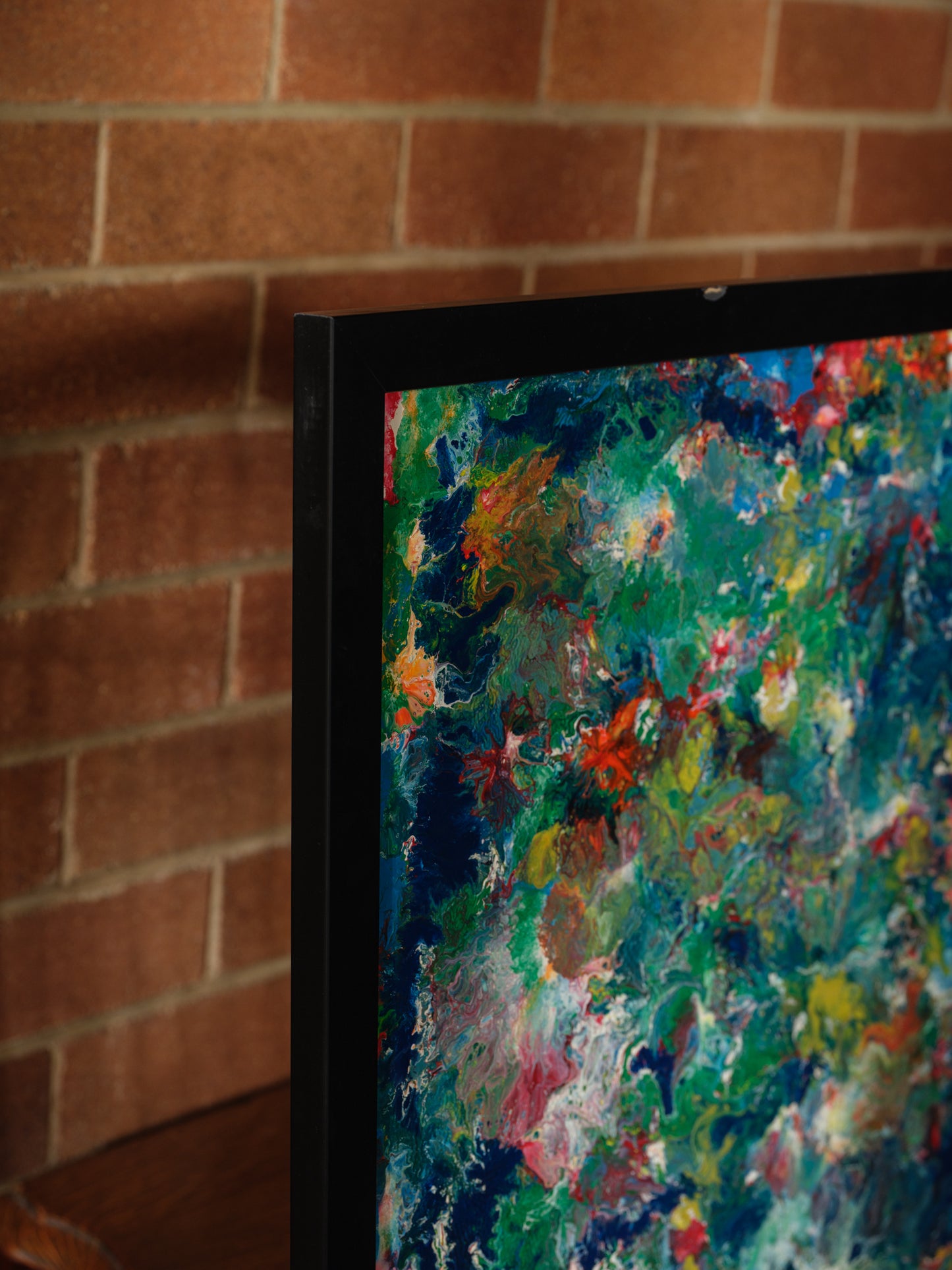 Abstract acrylic painting titled Verdant Drift II, with layered greens, earthy undertones, and vivid color variations suggesting organic textures.