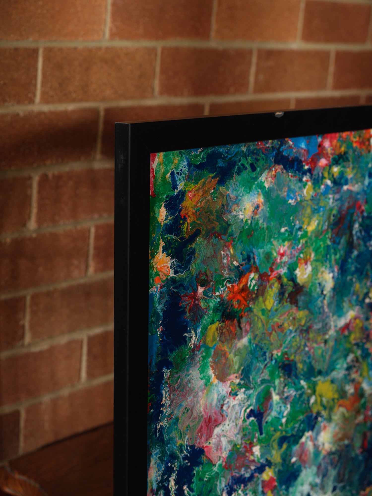 Abstract acrylic painting titled Verdant Drift II, with layered greens, earthy undertones, and vivid color variations suggesting organic textures.