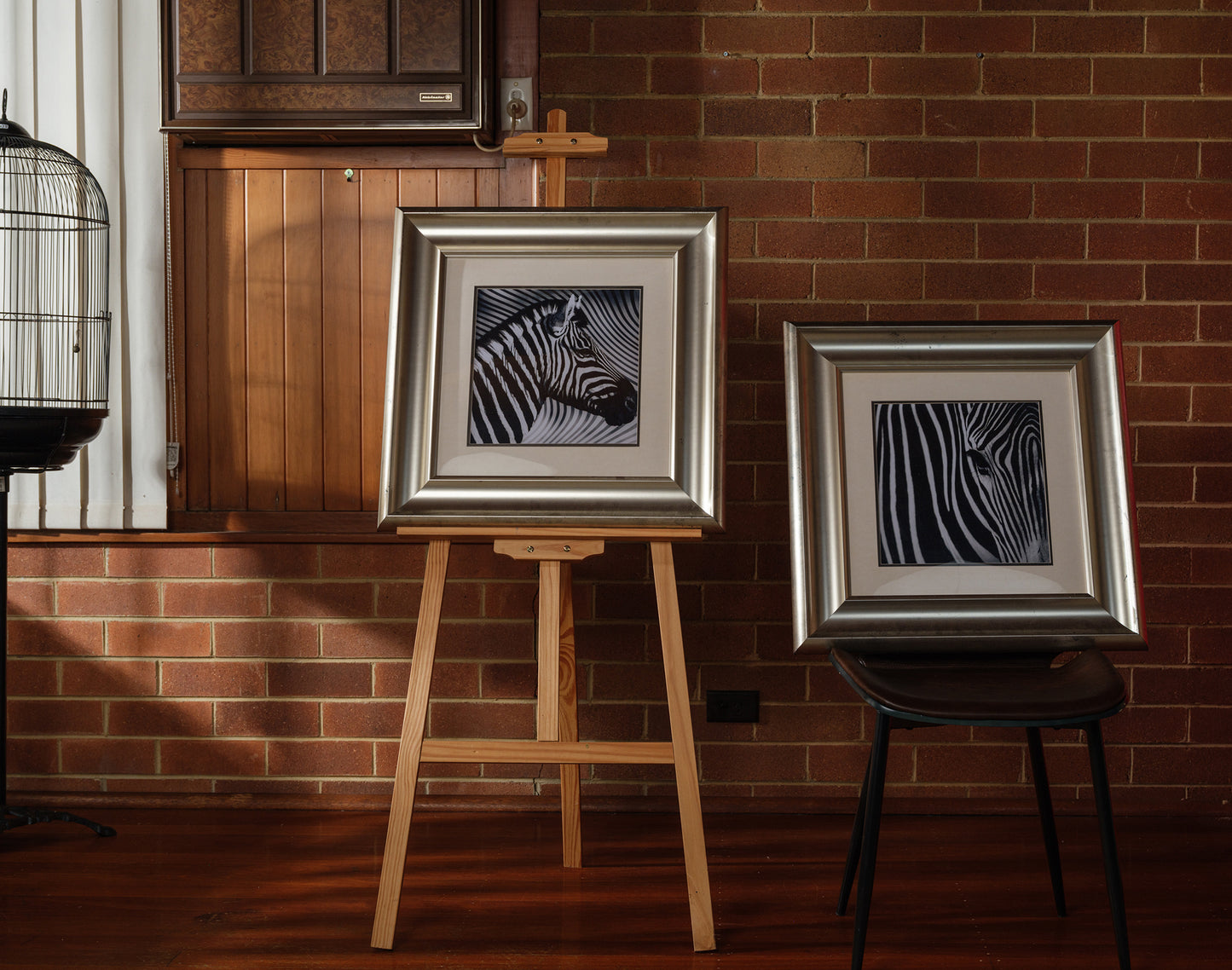 Fine art prints titled Zebra Pair, featuring two framed black and white zebra portraits with bold stripes, sold together as a pair.